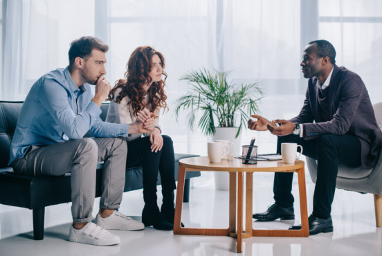 three people talking